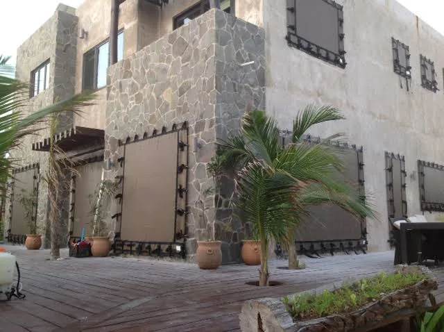 Hurricane screens on multi-window home