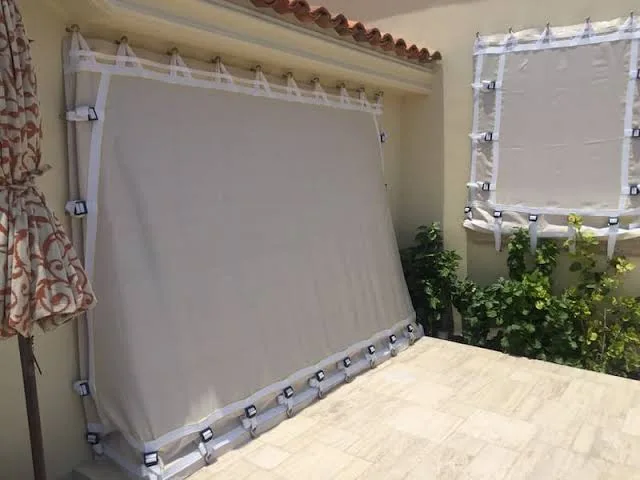 Curved balcony hurricane mesh installation